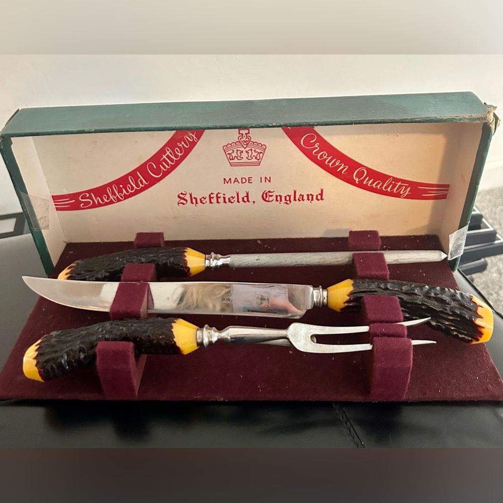 Sheffield Cutlery; carving knife and fork with sharpener.